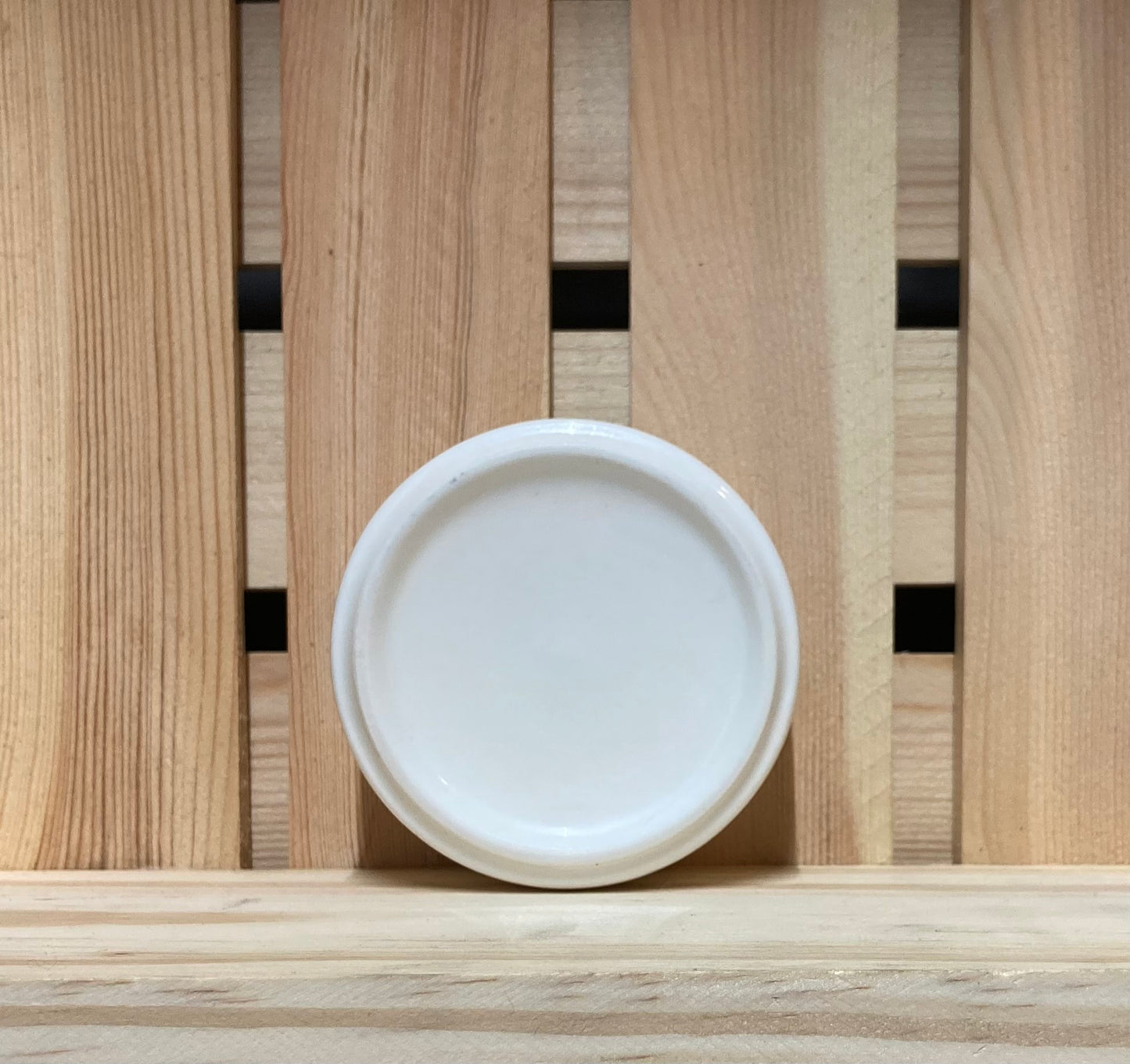 white ceramic ashtray