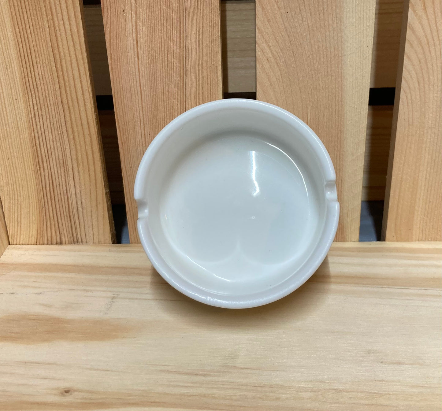 white ceramic ashtray