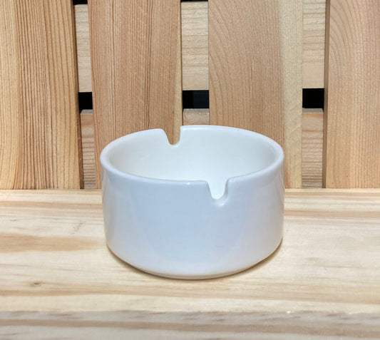 white ceramic ashtray
